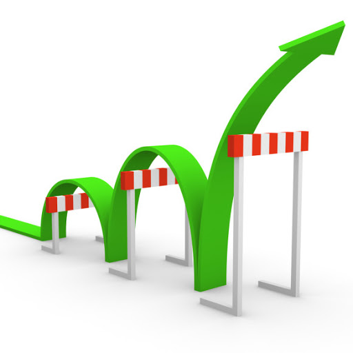 A green arrow leaping over three hurdles and rising